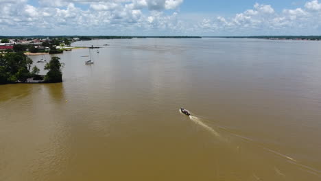 Flying-behind-a-motorised-canoe-in-Guiana.-Saint-Laurent-du-Maroni-Mana-river